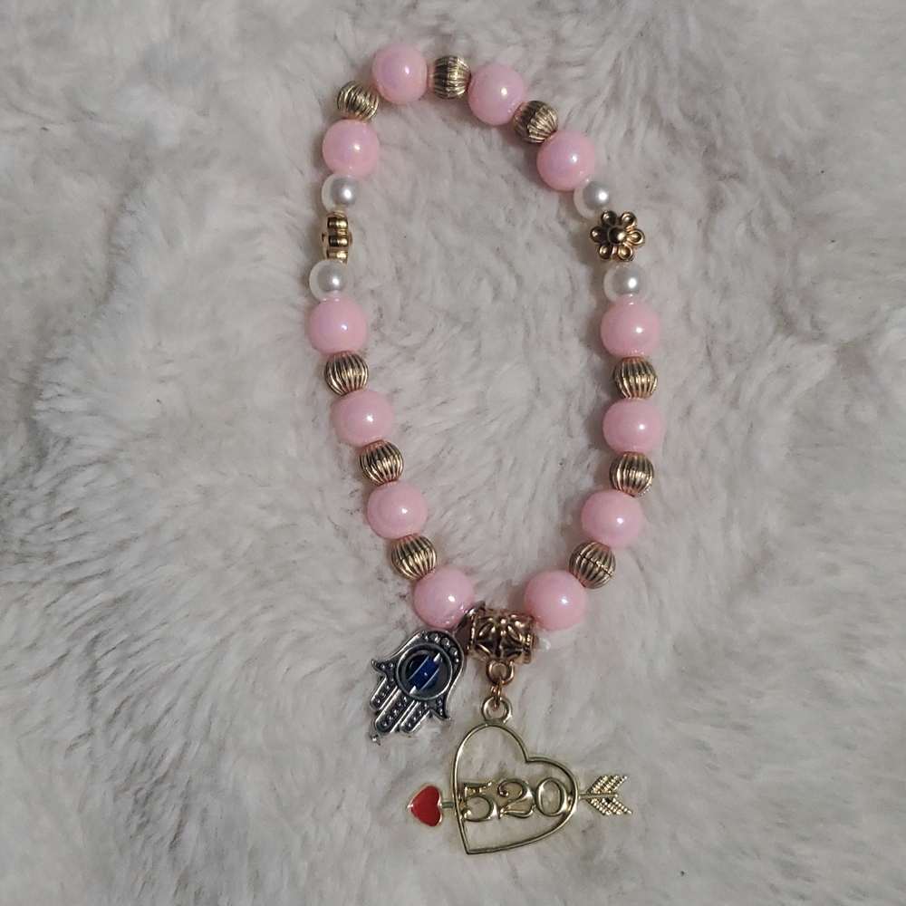 Pink and Gold Beaded Bracelet with Charms